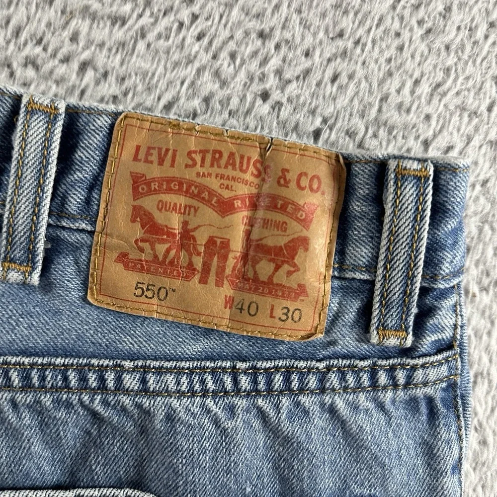 VINTAGE Levi's 550‎ Jeans Mens 40x30 Light Wash Distressed Fading